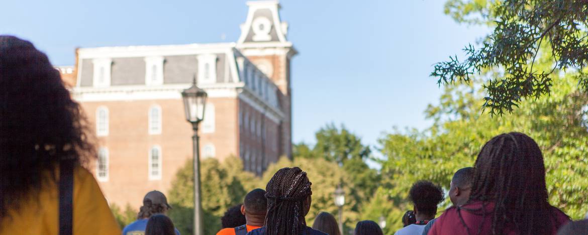 Students walking in front of Old Main.